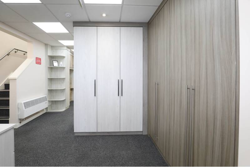 contour furnishings showroom interior showcasing fitted wardrobes in white ash and ash wood finish